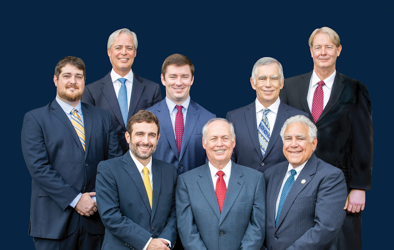 Group portrait of the attorneys at Morrow, Morrow, Ryan, Bassett and Haik