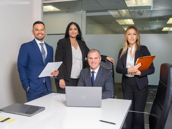 attorneys_office_groupshot_looking_at_camera_fernando_varsha_angel_maria