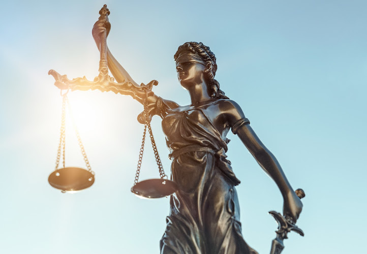 Lady justice. Statue of Justice on sky background. Legal and law concept