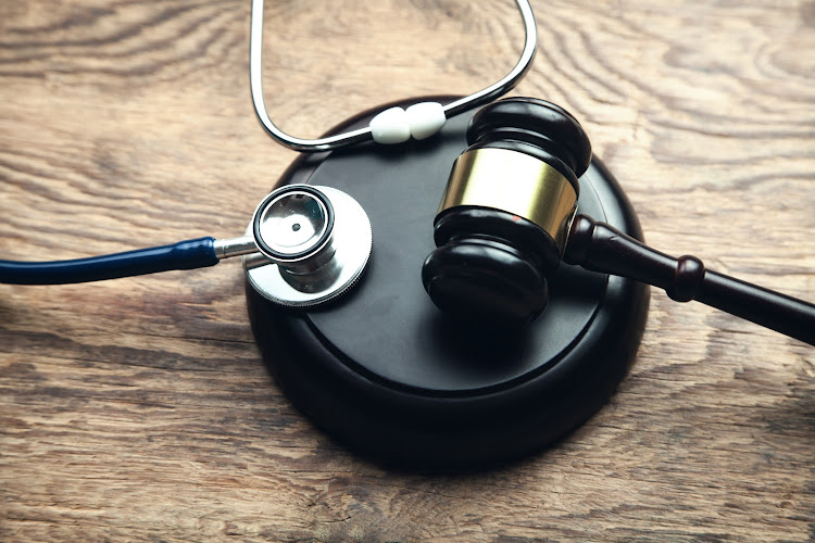 Judge gavel with stethoscope. Medical law